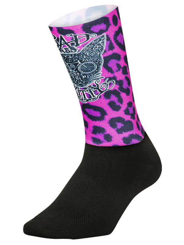 Kitty Pink Aero Cycling Socks.Featuring a two-part construction with a form fitting aero upper sock that provides a light compressive, flexible fit and a lower layer to provide breathability and support.