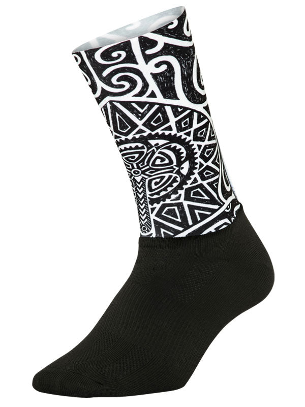 Zanzibar Black Aero Cycling Socks.Featuring a two-part construction with a form fitting aero upper sock providing a light compressive, flexible fit and a lower layer to provide breathability and support. 